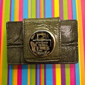 Kate Spade leather turn lock card case. Green